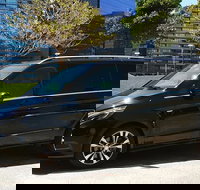 Sydney Airport Transfer in a Luxury People Mover 1-6pax TO Sydney City - Holiday Jervis Bay