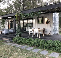 Absolute riverfront shipping container cabin - Holiday Jervis Bay