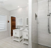 Bathers across the bay from Port Douglas - Holiday Jervis Bay